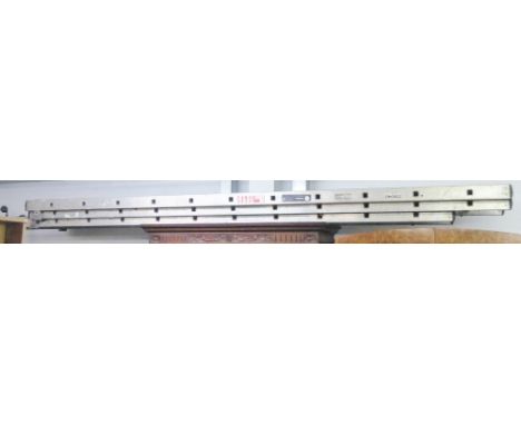 A LARGE SET OF ALUMINIUM TRIPLE EXTENSION LADDERS AND AN EXTENDING ROOF LADDER 