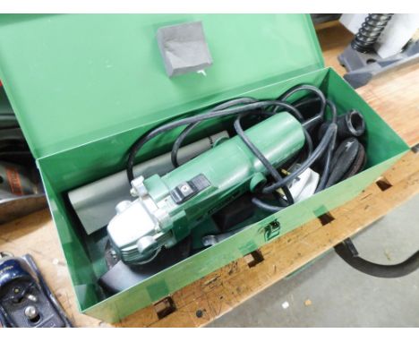 AN ELECTRIC ANGLE GRINDER 