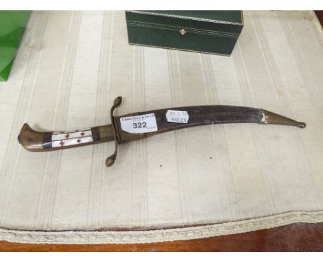 A MIDDLE EASTERN CURVED DAGGER WITH SCABBARD 