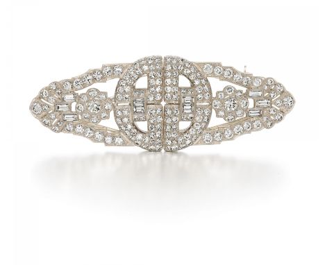 DIAMANT-DOPPELCLIP-BROSCHE. Datierung: Um 1930. Material: 750/- Weißgold, getestet. Gesamtgewicht: ca. 24,5 g. Maße: 7,3 x 2,