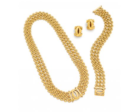 CARTIERPenelope Double C. Set: Gold-Collier, Armband und Ohrschmuck. Herkunft: Frankreich. Datierung: Um 1990. Material: 750/