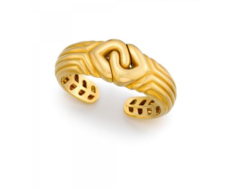 BULGARIDoppio Cuore. Gold-Armspange. Herkunft: Italien. Datierung: Um 1980. Material: 750/- Gelbgold, Punze. Gesamtgewicht: c