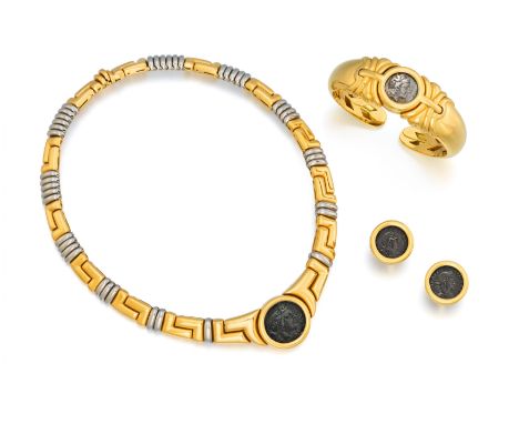 BULGARIMonete. Antikes Münz-Set: Collier, Armspange und Ohrclips. Herkunft: Italien. Material: 750/- Gelbgold, Stahl, Punze. 