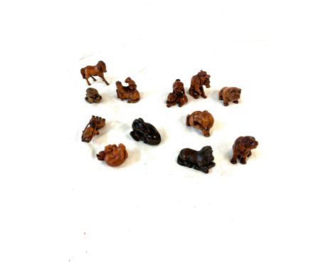 Selection of carved tagua nut netsuke 
