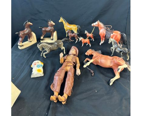 Selection of vintage toys includes Cowboy figure, horses etc 