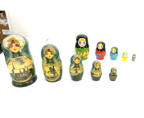 Vintage wooden hand painted Russian doll signed at the bottom, and 1 other 