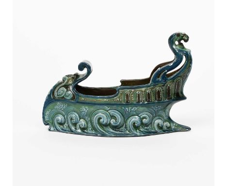 A C H Brannam Barum Ware pottery Galleon centrepiece, dated 1900, pierced and modelled design, glazed in shades of green, bro