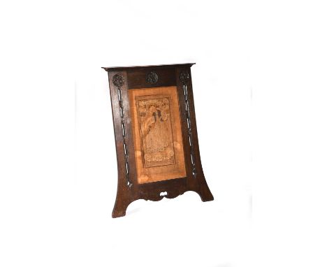 An oak easel backed frame with embroidery panel the design attributed to Edgar Wood, the flaring rectangular frame with flari