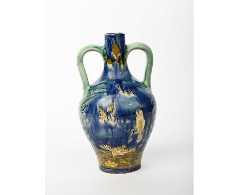 A Della Robbia twin-handled Moorish vase by John Cecil Shirley and Ruth Bare, dated 1917, shouldered form with applied twin-h