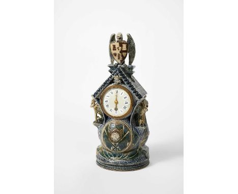 An Important Martin Brothers stoneware clock case made for Frederick Nettlefold dated 1875, architectural form, domed base su