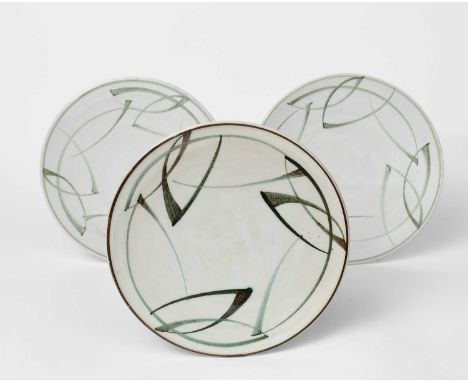 Φ Alan Caiger-Smith MBE (1930-2020)a set of three tin-glaze earthenware plates, with brushed design, date code for 1978,paint