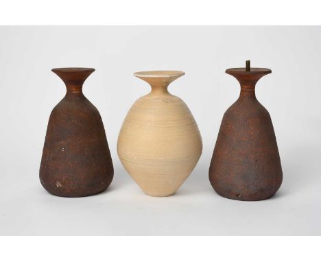 Φ Waistel Cooper (1921-2003)a pair of stoneware lamp bases, shouldered form, glazed matt iron, and an unglazed vase by Waiste