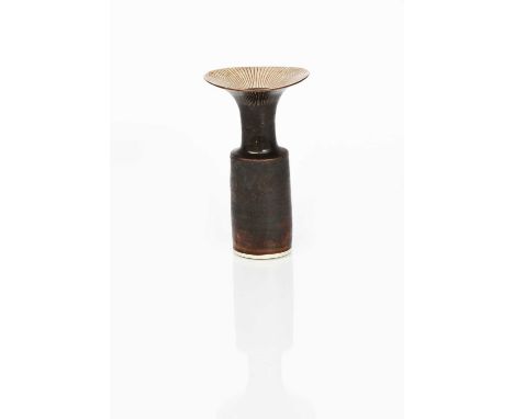 Φ Dame Lucie Rie DBE (1902-1995)a porcelain bottle vase, shouldered form, cylindrical neck with flaring rim, the neck sgraffi