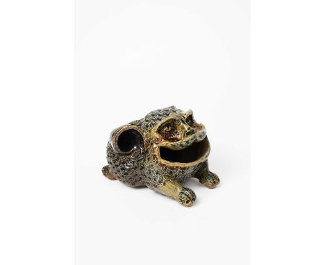 A rare and early Martin Brothers Grotesque stoneware spoonwarmer by Robert Wallace Martin, dated 1879, modelled as anthropomo