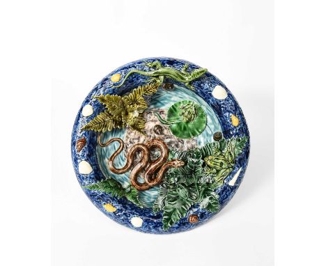 Geoffrey Luffa Bernard Palissy style majolica wall dish, circa 1998circular, modelled and applied with a pond scene, a young 