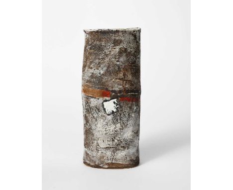 Φ Robin Welch (1936-2019)a stoneware cylinder, elliptical form, incised and painted with geometric motif in red, white and ta