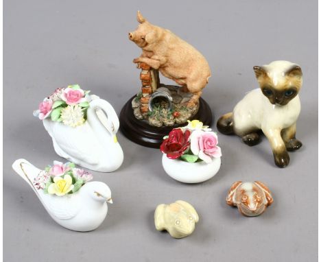 A Royal Doulton composite model of a pig and three china posies, a Goebel Siamese cat and two pottery frogs.