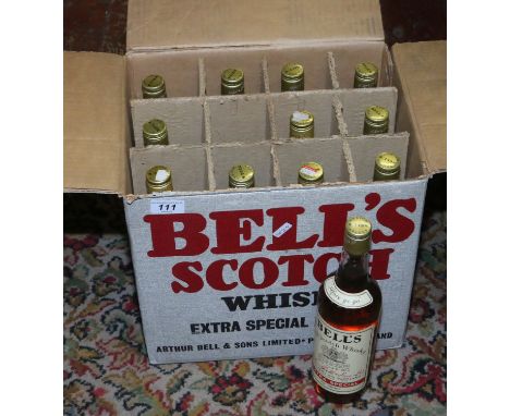 A case of twelve 75cl bottles of Bells Old Scotch Whisky blended in Scotland