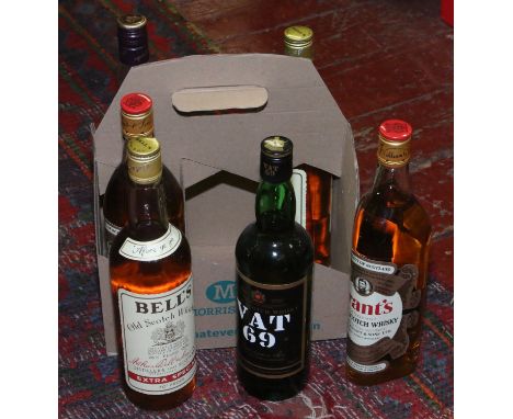 A case of six Scotch Whisky 75 and litre of Bells Grants VAT 69.