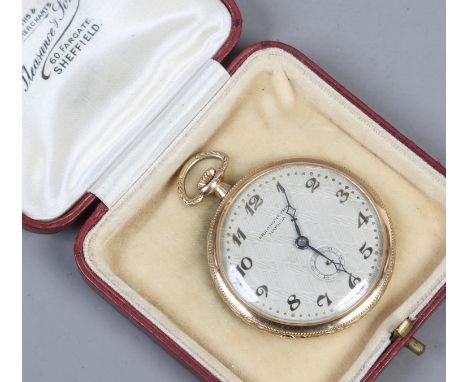 A cased 14 carat gold Art Deco slim pocket watch with engraved silver dial, applied Arabic numeral markers and signed Chronom