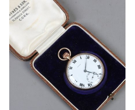 A cased 9 carat gold pinnacle pocket watch with enameled dial having Roman numeral markers and subsidiary second finger. "run