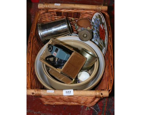 A basket of miscellaneous ceramics and silver plate tankard pancheons and a Diana camera.