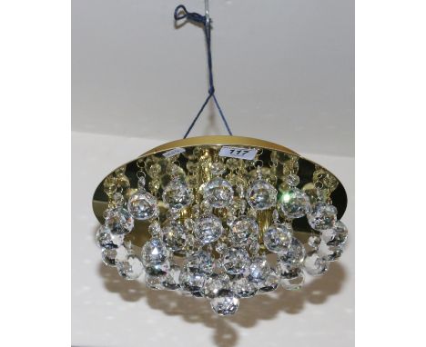 A brass and multi cut glass pendant ceiling light, new