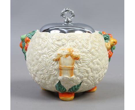 A Newport pottery Clarice Cliff Celtic harvest biscuit barrel with chrome cover 