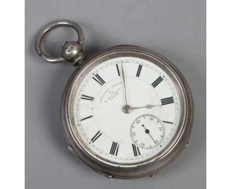 A silver cased English lever pocket watch W. Richman Leeds with enamel dial and subsidiary seconds, assayed Birmingham 1908.