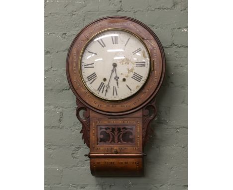A C19th walnut cased drop dial wall clock.