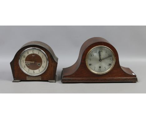 A vintage oak cased Smiths Enfield 30 hour mantel clock along with another oak cased eight day mantel clock.