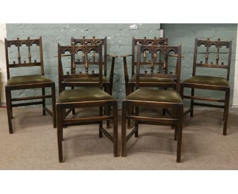 A set of six Ercol spindle back chairs, including two carvers.