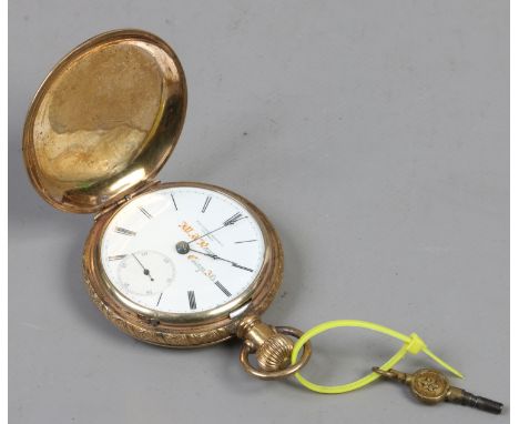 A gold plated hunter pocket watch with white enamel dial second subsidiary dial engraved case and key by Rockford Watch Compa