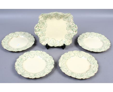 An early C19th creamware part dessert service moulded with leaves edged in green enamel comprising; twin handled square dish 