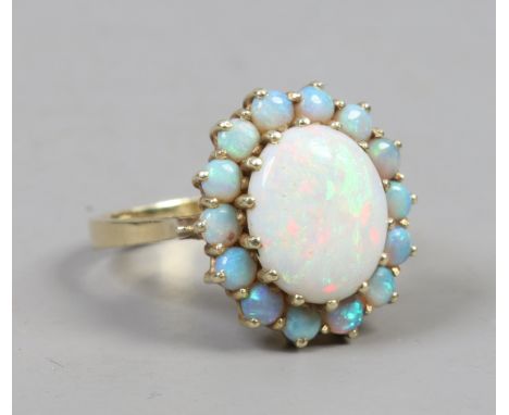 A 14 carat gold opal cluster ring