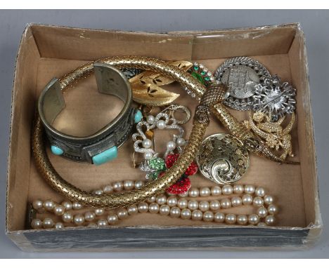 A box of costume jewellery including simulated pearl four row bracelet, metal bangle with turquoise effect and a gilt serpent