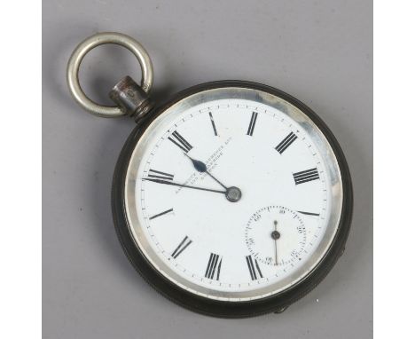 A silver pocket watch with enamel dial having subsidiary seconds.