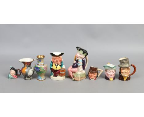 A group of character jugs including melba ware, Kelsboro ware examples along with a cloisonne vase.
