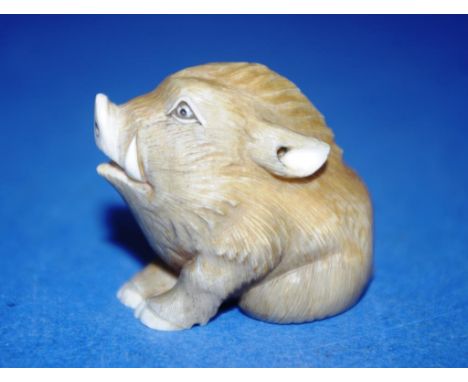 Antique Japanese carved ivory netsuke pig figure, signed to base. This item may not be exported without CITES documentation. 