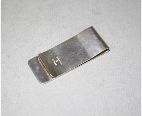 Tiffany sterling silver money clip marked Tiffany/Sterling. Weight 21 grams approx.