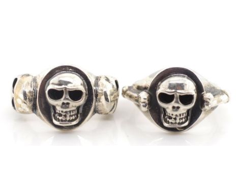 Two vintage sterling silver signet rings both with applied skulls marked Birmingham JWB 1985. Approx 15.9 grams total weight,