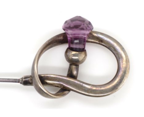 Edwardian sterling silver kilt pin by Pearce & Thompson set a with a glass amethyst  Marked Birmingham 1910. Approx 13cm leng