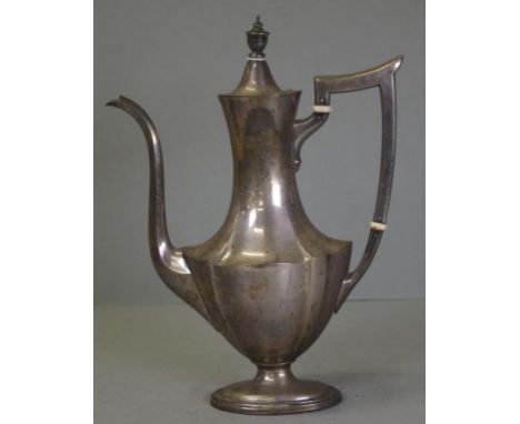 Gorham USA sterling silver coffee pot marked to base and # 2311, "Plymouth,' 1 and 1 quarter pint capacity. Height 28cm appro