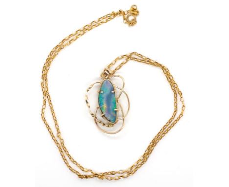 Opal and 9ct gold pendant and chain Marked 9ct to bail, 375 Italy to chain. Approx boulder opal 20.2mm x 8.2mm x3.8mm free fo