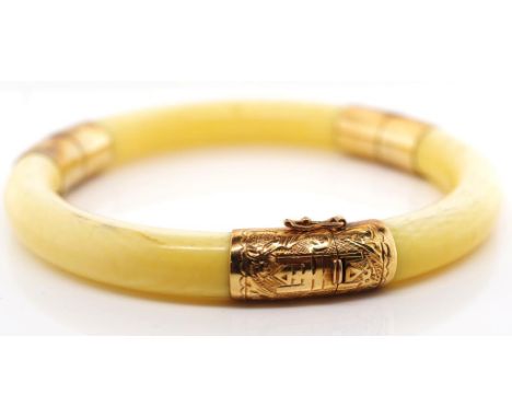 Vintage Chinese ivory and gold bangle four parted hinged ivory bangle with gold finial ends. Profusely engraved with calligra