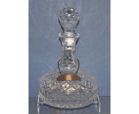 Stuart cut crystal port decanter (height 27cm approx); together with an Elizabeth II sterling silver spirit label, Birmingham