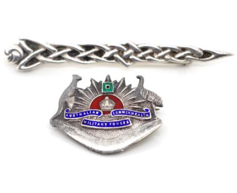 An Australian silver and enamel military brooch and a Celtic kilt brooch