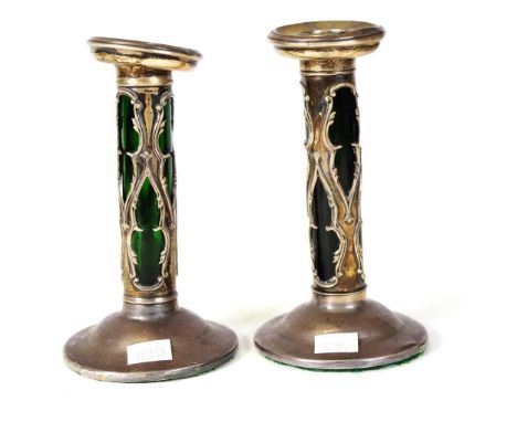 Pair of pierced sterling silver candlesticks with green glass insert, hallmarked Birmingham 1903, height 15.5cm approx (as in