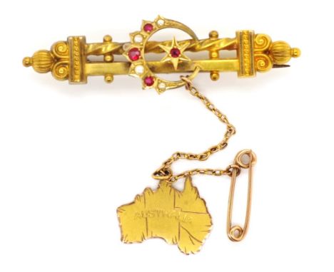 Antique Australian 15ct gold brooch by William Drummond Melbourne. A well made seed pearl and red gemstone set crescent and s
