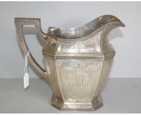 Good USA sterling silver jug engraved decoration, marked to base & # 443, 4 pints, Spaulding & Co. Height 20cm approx. Weight